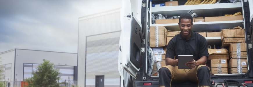 Delivery Person on a Tablet